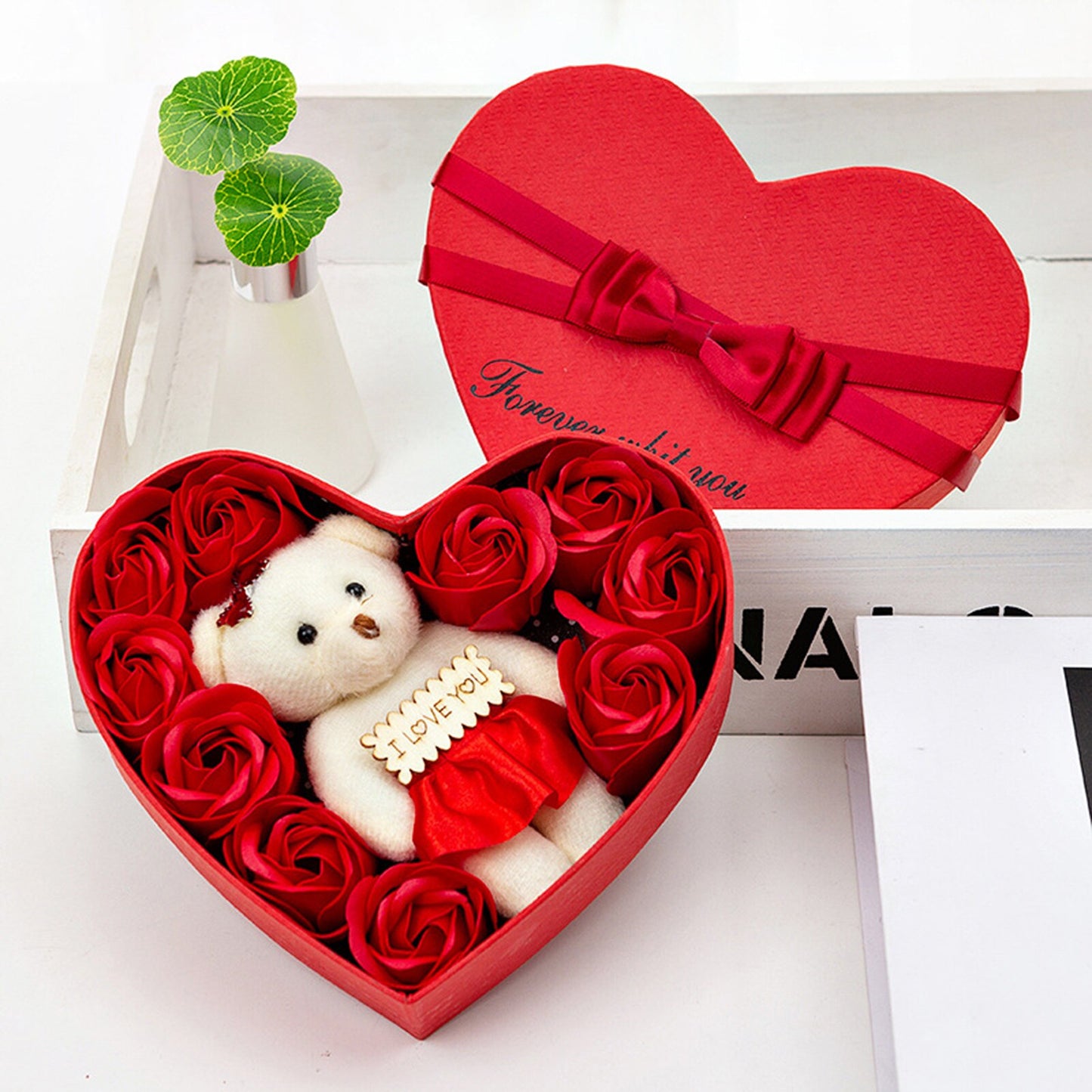 Lovely bear with eternal roses